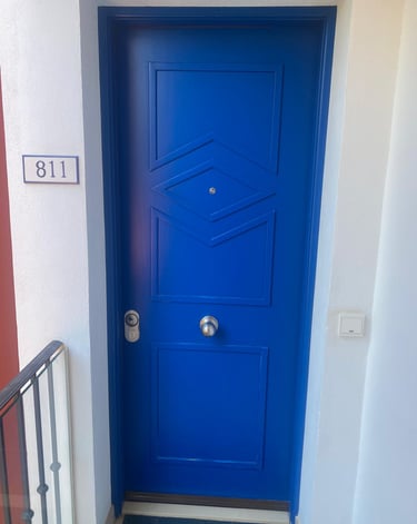 a blue door with a blue door and a white door
