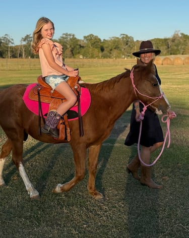 Snickers taking a nine-year-old cowgirl on a joyful ride