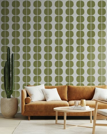 Olive green geometric wallpaper with bold half-circle motifs, styled in a modern living room