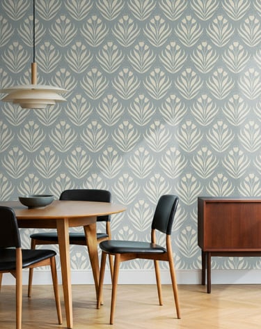 Soft blue and cream botanical wallpaper with an elegant tulip motif, styled in a modern dining room