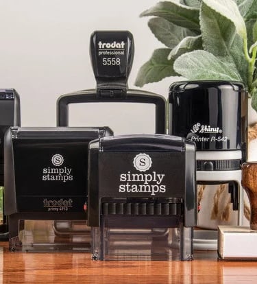 a bunch of self ink stamps 