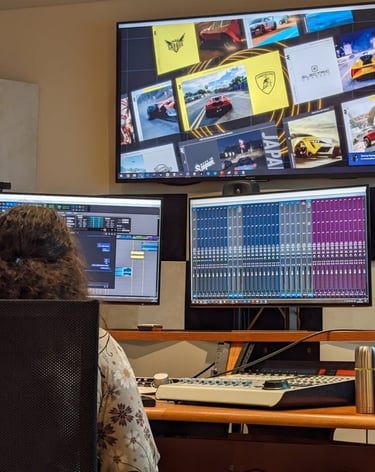 Federica mixing a trailer in Ubisoft Audio room