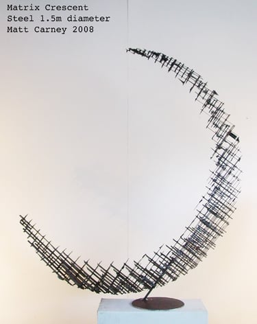 a steel cross-hatched crescent shaped sculpture