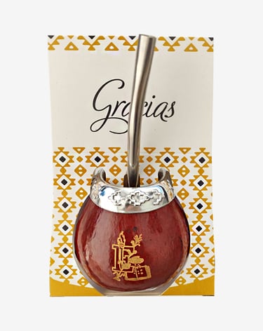 Traditional Gourd mate gourd with silver rim and bombilla straw for yerba mate tea.