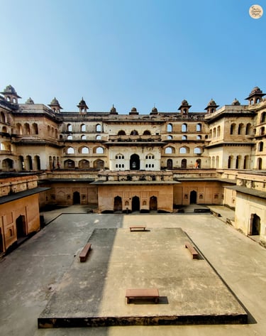 Architectural splendor of Raja Mahal, Orchha - captured in its full form and royal beauty.