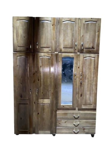 a wooden cabinet with a mirror and a mirror