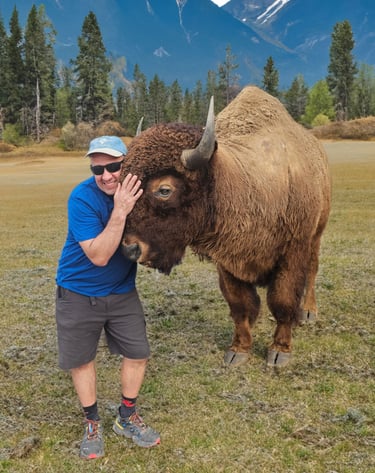 Jon hugging a bison - read the blog!