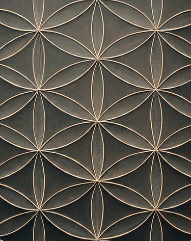 A geometric symbol called the Flower of Life, formed by overlapping circles.
