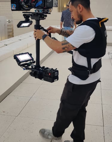 Jonathan Calero operating steadicam on a rooftop 
