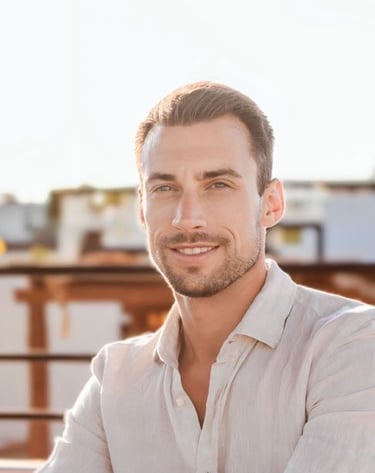 A professional headshot of Matt Jensen, the founder of ExcelKits, smiling in a white buttoned shirt 