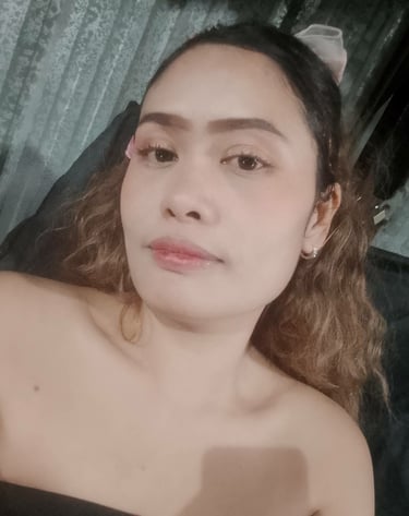 Head and shoulder photo of lady in black dress