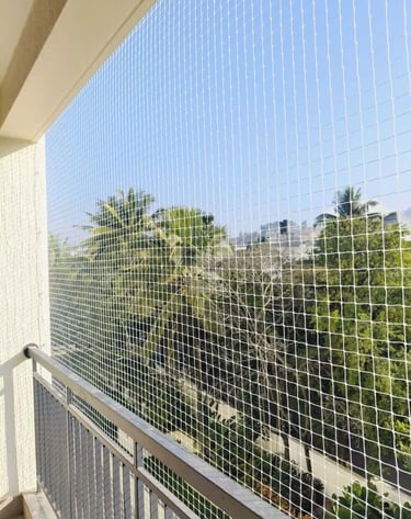 Technician from Arjilli Enterprises carefully fitting the net frame into place.