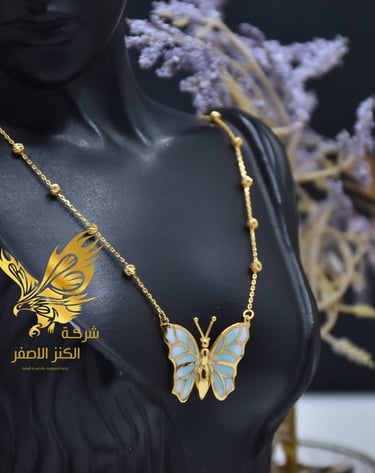 a woman's torso with a butterfly necklace | Alkanz Alasifar | Antalya Jewellery
