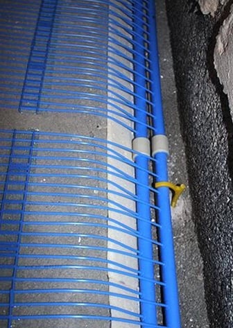 Mat distributor pipes are placed in slots