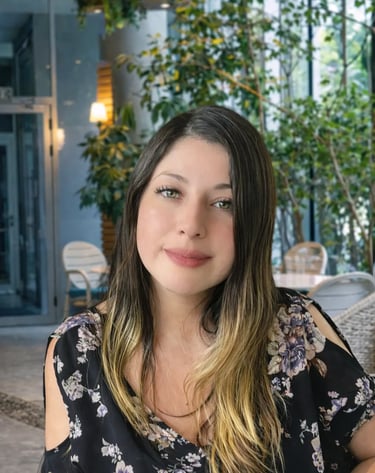 a woman sitting on a couch in a room