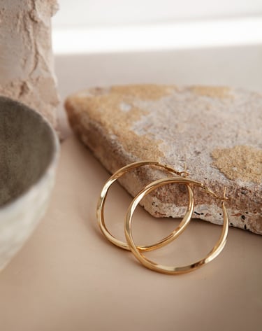 aury inc has a large section of hoop earrings