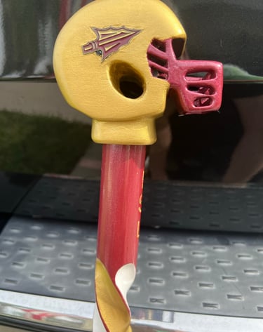 Carved pointy thingy Football Cane