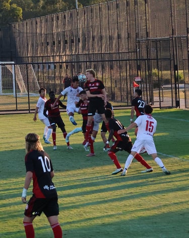 Banri challenges for a corner away to Western Sydney Wanderers