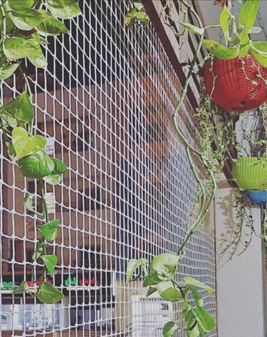 Sports net stretched across a local playground, demonstrating durability and safety.