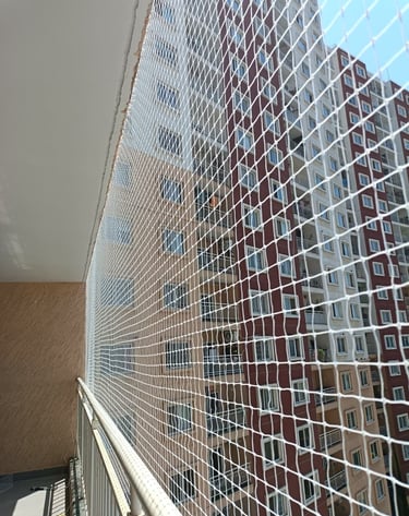 Pet safety net installed around a duct area, ensuring a safe environment.