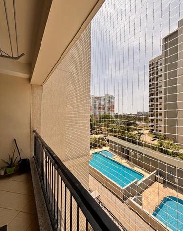 Anti pigeon net installation for residential balcony in Vile Parle West