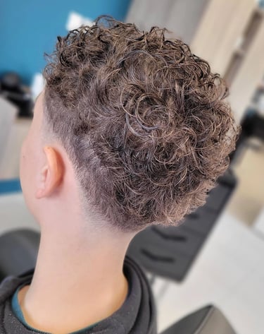 oupe homme et enfant au salon de coiffure l'Arabesque à Guilherand-Granges.