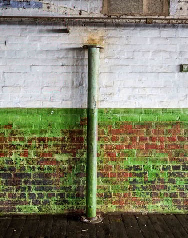 Textured paintwork and wall in the main room at Atlas Studios.