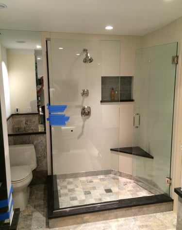 Contemporary bathroom showcasing custom build shower.
