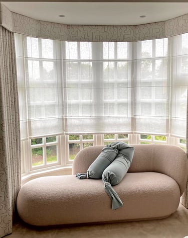 style and elegance roller and curtains in a pelmet