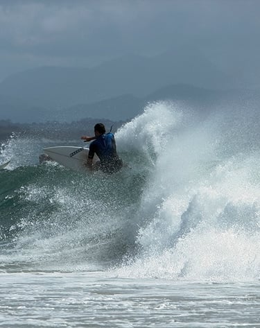A surfer at Byron Bay