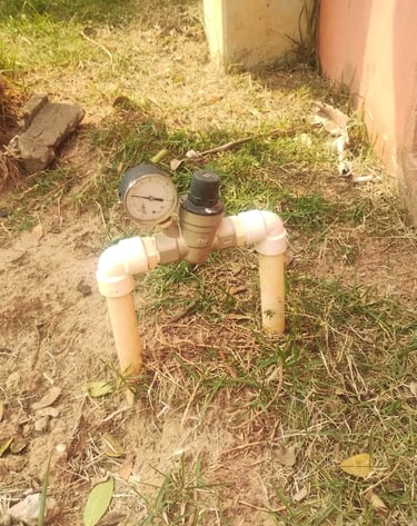 a water meter with a water meter on the ground