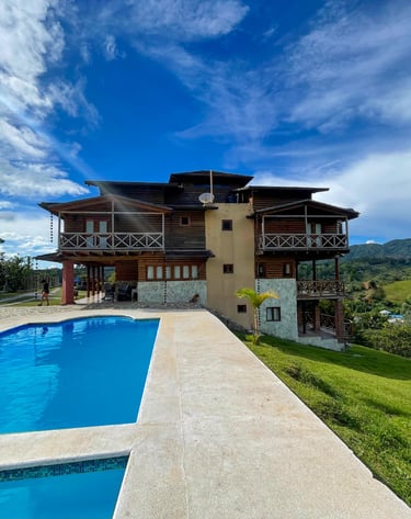 a large house with a pool and a large pool