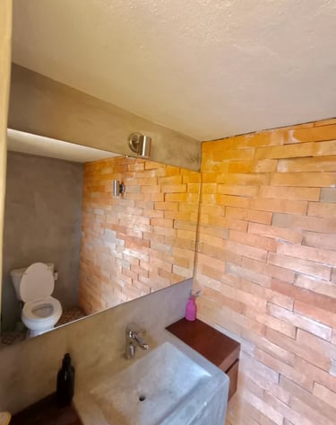 bathroom in the rooftop terrace in this vacation home in san miguel de allende
