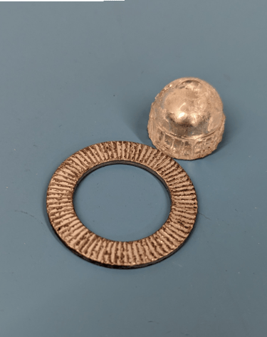 a metal object with a ring on it