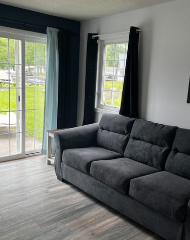 living room lakeside fireplace lake views southern michigan vrbo airbnb dock short term rental