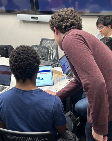 Will Rosenthal assisting a new memebr with a PicoCTF challenge problem.
