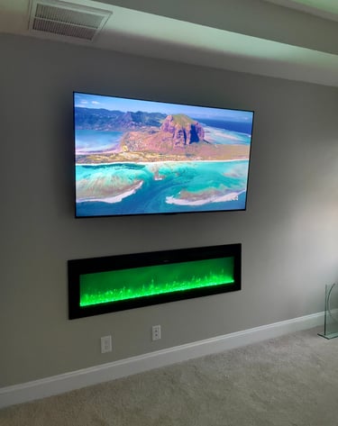 Hidden wire TV install with electric fire place