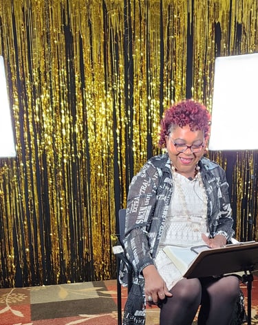 Elaine Mitchell Jones behind-the-scenes during video podcast shoot, produced by Exclusif Spark Media