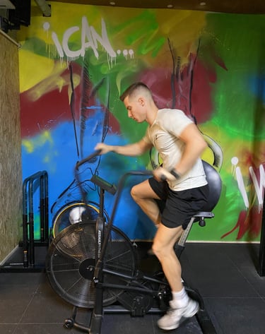 young man using airbike