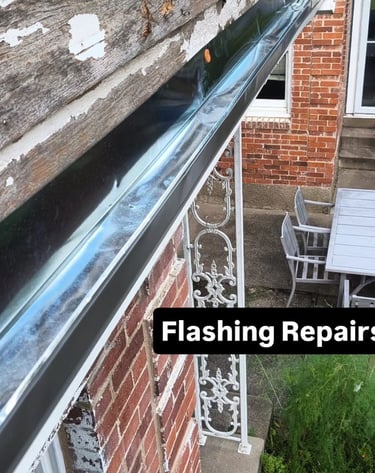 new flashing installed on the exterior side of a house in preparation for new siding