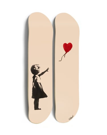 a pair of skateboards with a girl with a balloon