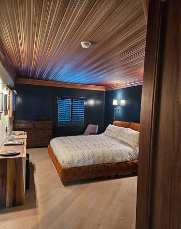 a chic hotel room with shutters el paso