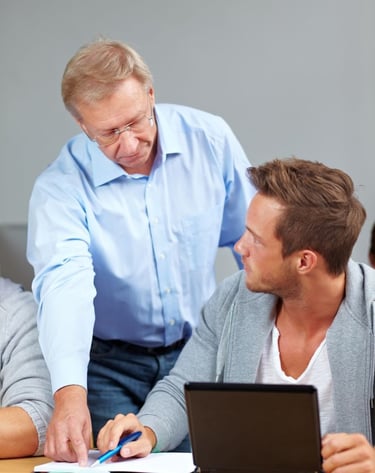 School psychologist or teacher working with student, progress evaluation, education follow-up, one-on-one session