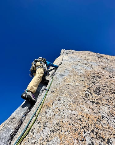 Hand jamming on Spigolo Vinci, Pizzo Cengalo. Valmasino, Italy