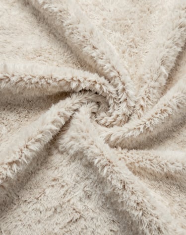 Fluffy recycled polyester fiber filling ready for plush toy stuffing.