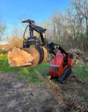 Wood and debris machine for tree removals and trimming. A handy helper with our Olathe Kansas jobs