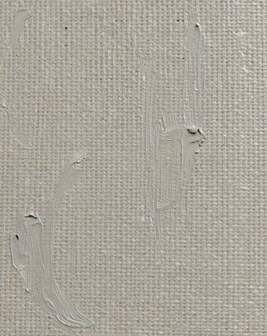 Macro shot of a painting detail showing the intricate texture of linen canvas under thin washes of #6B705C paint. The lighting is soft and natural, emphasizing the organic and personal nature of the artist's process.