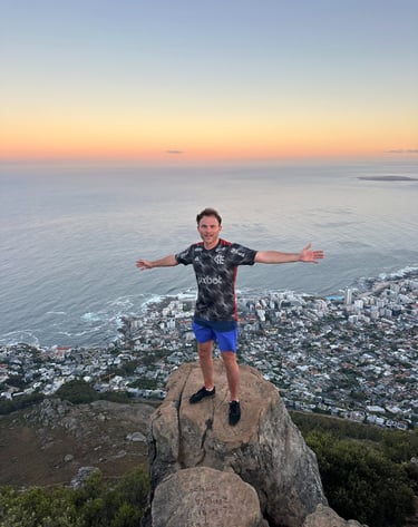 Guests at the top of Lions Head at sunrise
