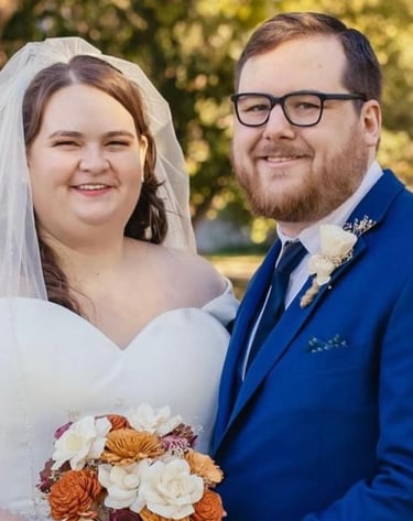 bride and groom with her bouquet