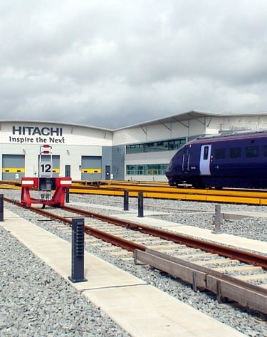 New rail maintnance shed with blue Javelin train standing on the aproach road to the shed